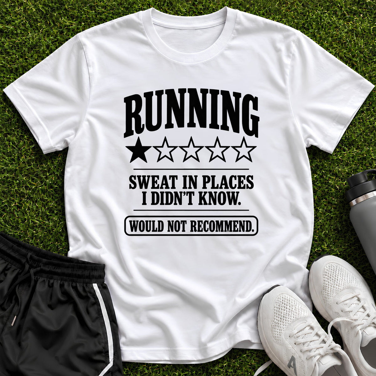 A white graphic t-shirt with black text reading 'RUNNING SWEAT IN PLACES I DIDN'T KNOW. WOULD NOT RECOMMEND.